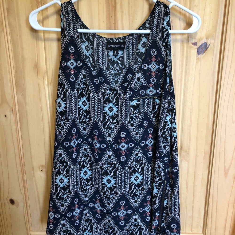 High low sleeveless blouse